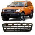 Front Grille Compatible with 1998-2006 Toyota Land Cruiser LC100 TRD Grill with Lights and Letters